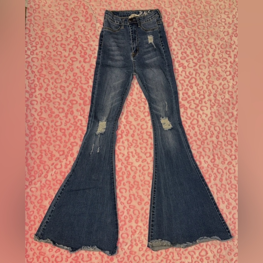 High-Rise Distressed Flare Jeans in Dark Wash
